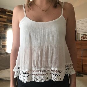 Cute semi sheer crop top with lace detail